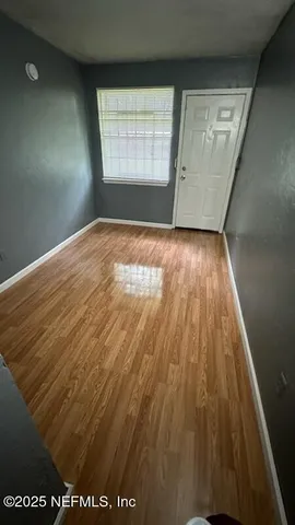 a view of a kitchen with a window