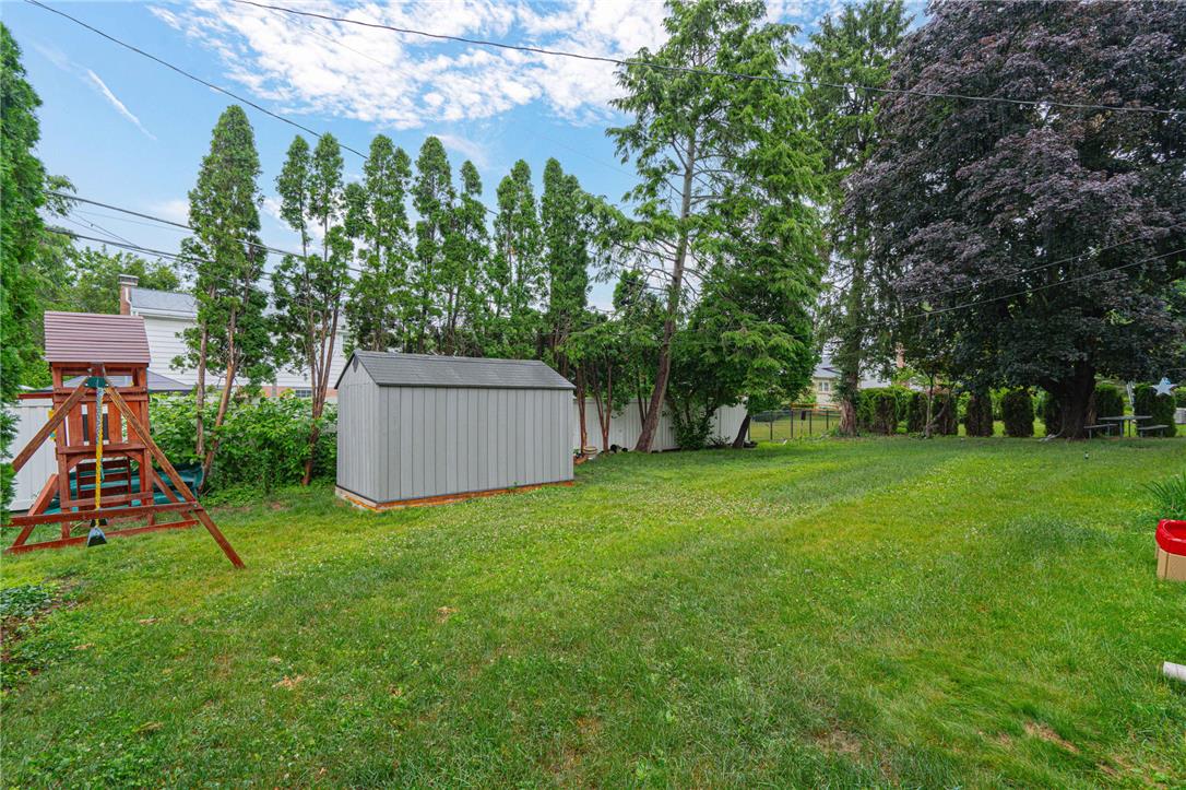 285 Bridle Path Road Bethlehem, PA 18017 - Photo 51 of 54 a view of a backyard with a garden and trees
