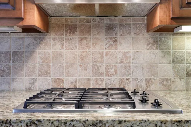 a view of a house with a snow on the road