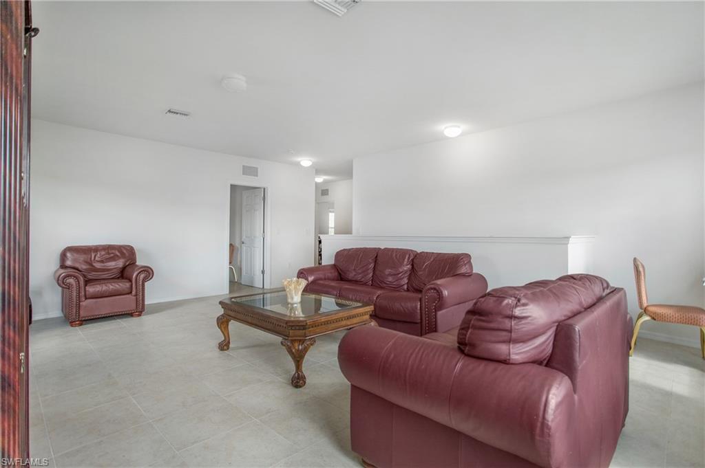 673 Hadley Street East Naples, FL 34104 - Photo 20 of 31 a living room with furniture
