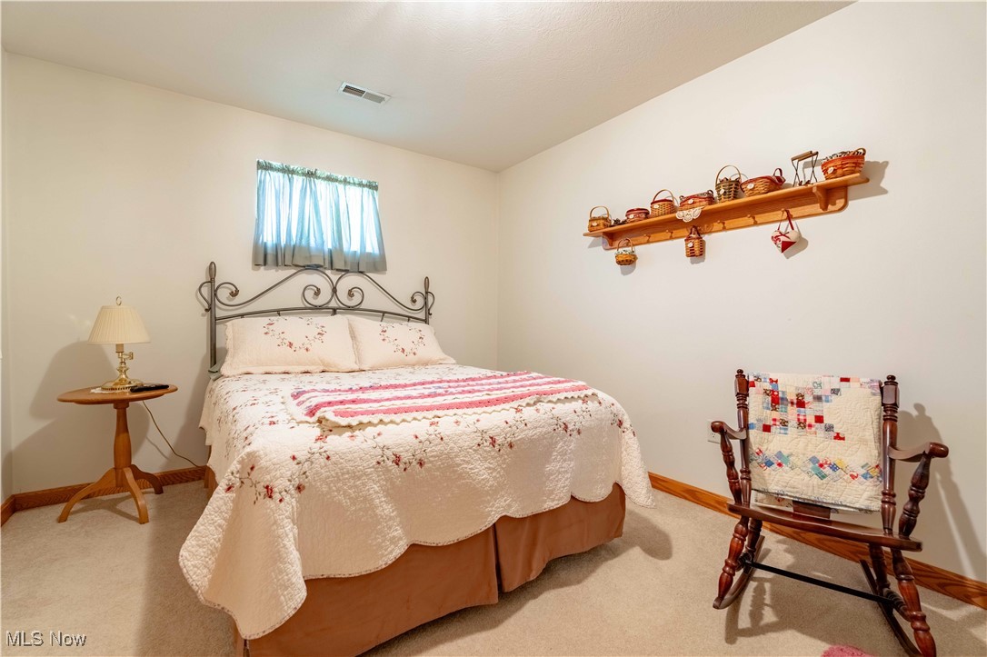 90480 Kilgore Ridge Road Scio, OH 43988 - Photo 16 of 39 Bedroom featuring light carpet and baseboards