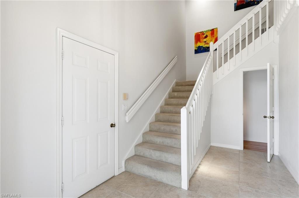 203 Via Perignon, Unit 24 Naples, FL 34119 - Photo 3 of 42 Entry foyer filled with natural light