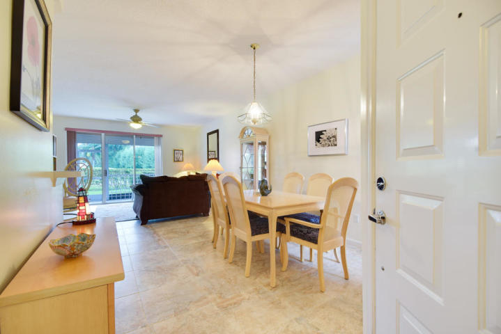 101 Muirfield Court, Unit 101F Jupiter, FL 33458 - Photo 4 of 20 foyer