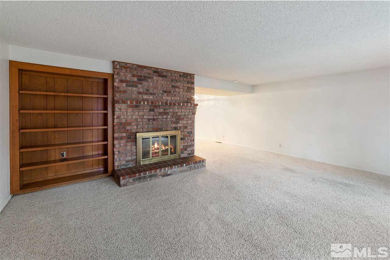 2107 Chicory Way Reno, NV 89509 - Photo 8 of 24 a view of an empty room and fire place