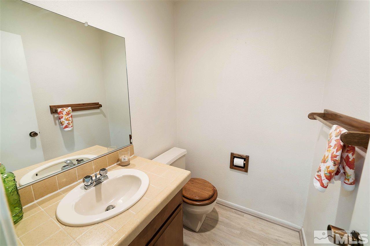 2107 Chicory Way Reno, NV 89509 - Photo 9 of 24 a bathroom with a sink and a toilet