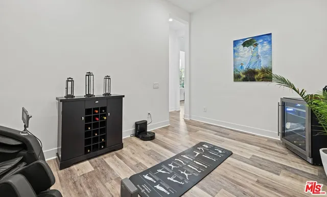 a kitchen with a stove a sink and a refrigerator