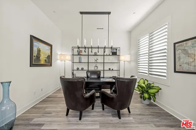 a view of a hall with stairs