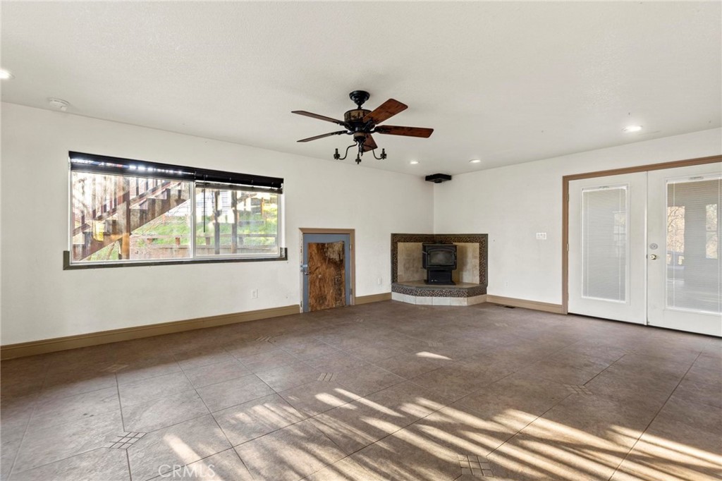 10761 Texas Hill Road Dobbins, CA 95935 - Photo 12 of 58 a view of a livingroom with a ceiling fan and window