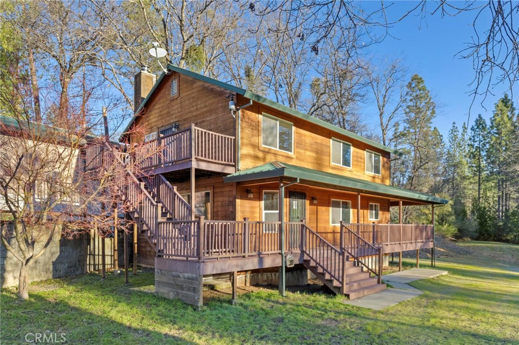 10761 Texas Hill Road Dobbins, CA 95935 - Photo 2 of 58 a view of a house with a yard and sitting area