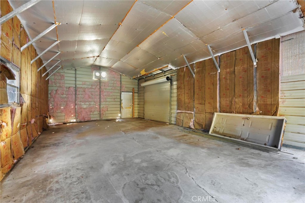 10761 Texas Hill Road Dobbins, CA 95935 - Photo 37 of 58 a view of an empty room with a couch