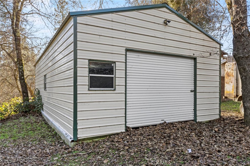 10761 Texas Hill Road Dobbins, CA 95935 - Photo 38 of 58 a view of a white house with a small space