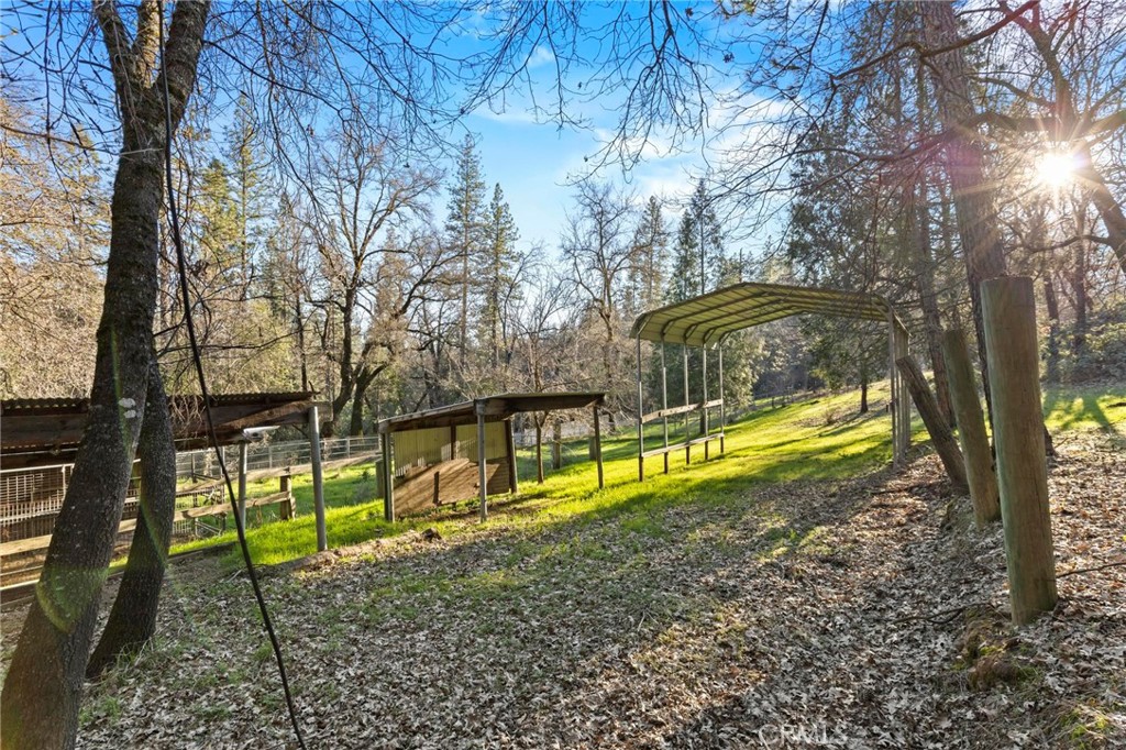 10761 Texas Hill Road Dobbins, CA 95935 - Photo 43 of 58 a view of a house with swimming pool and sitting area