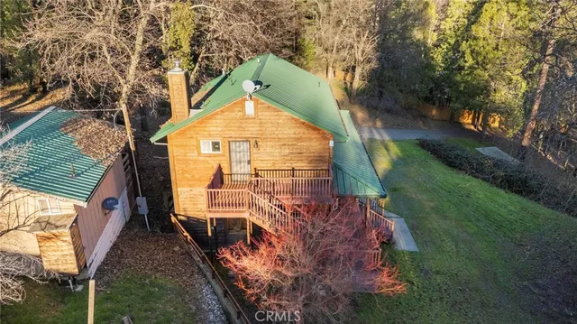 a view of a town with mountains in the background