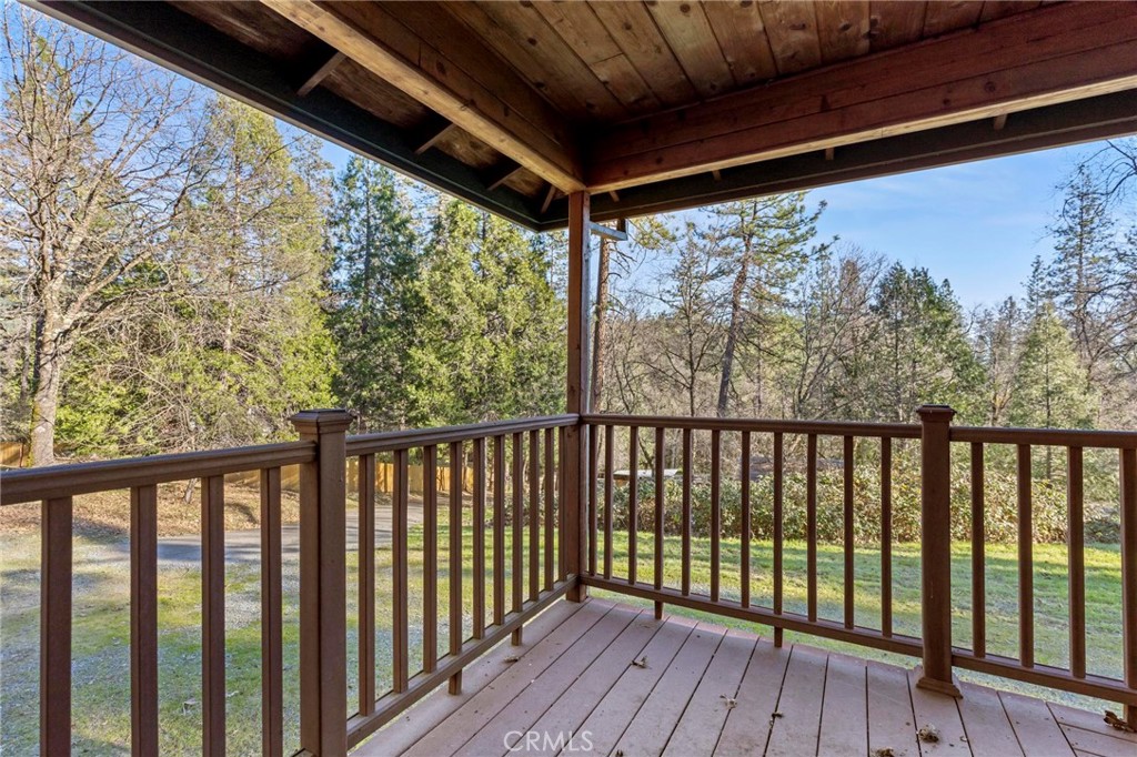 10761 Texas Hill Road Dobbins, CA 95935 - Photo 6 of 58 a view of a balcony with wooden floor