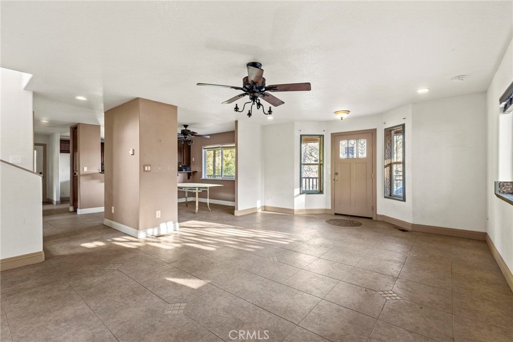 10761 Texas Hill Road Dobbins, CA 95935 - Photo 10 of 58 a view of an empty room with a kitchen