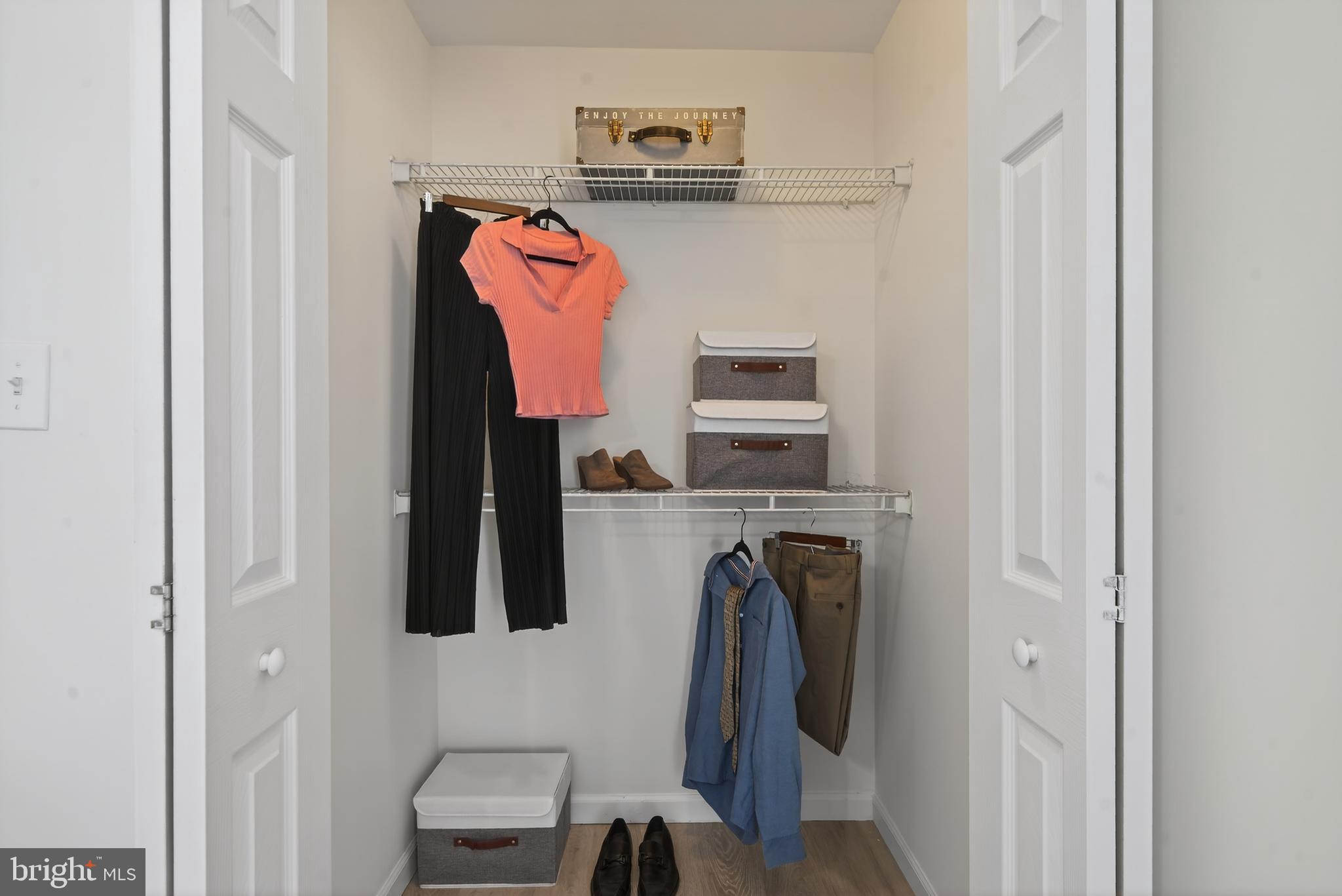 23616 Public House Road Clarksburg, MD 20871 - Photo 14 of 35 a view of walk in closet with clothes and shoes