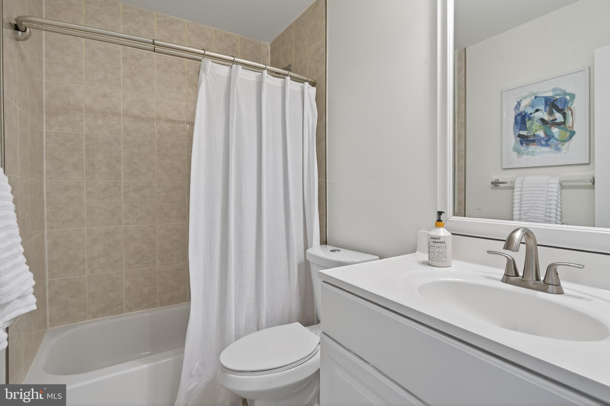 23616 Public House Road Clarksburg, MD 20871 - Photo 15 of 35 a bathroom with a sink toilet and shower