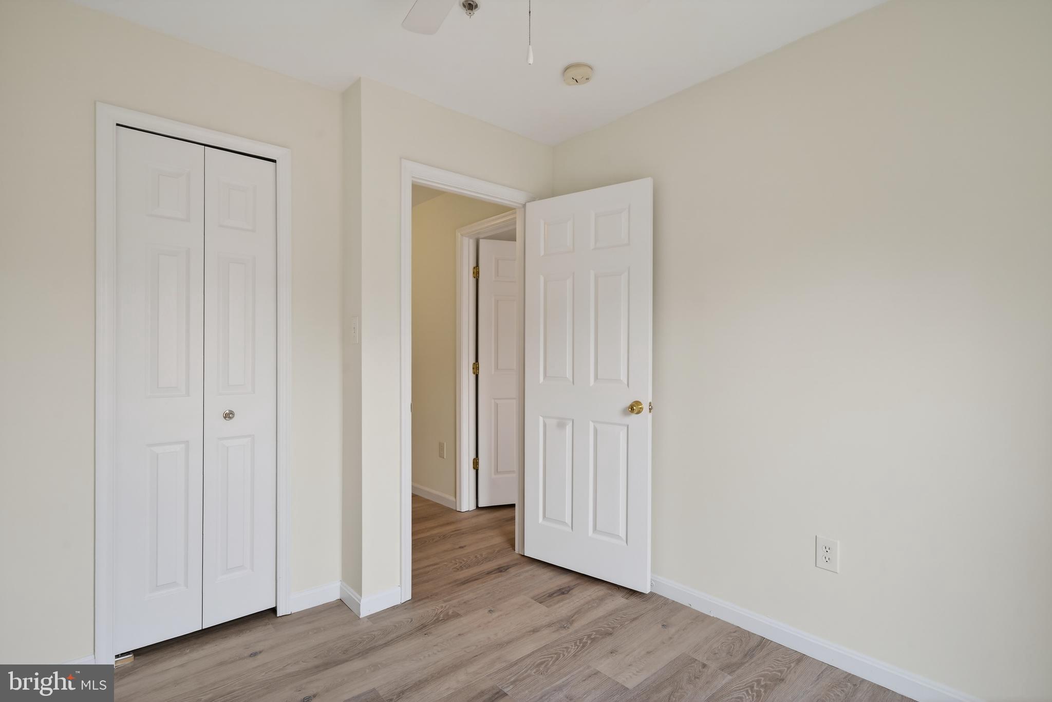 23616 Public House Road Clarksburg, MD 20871 - Photo 17 of 35 a view of a hallway with wooden floor