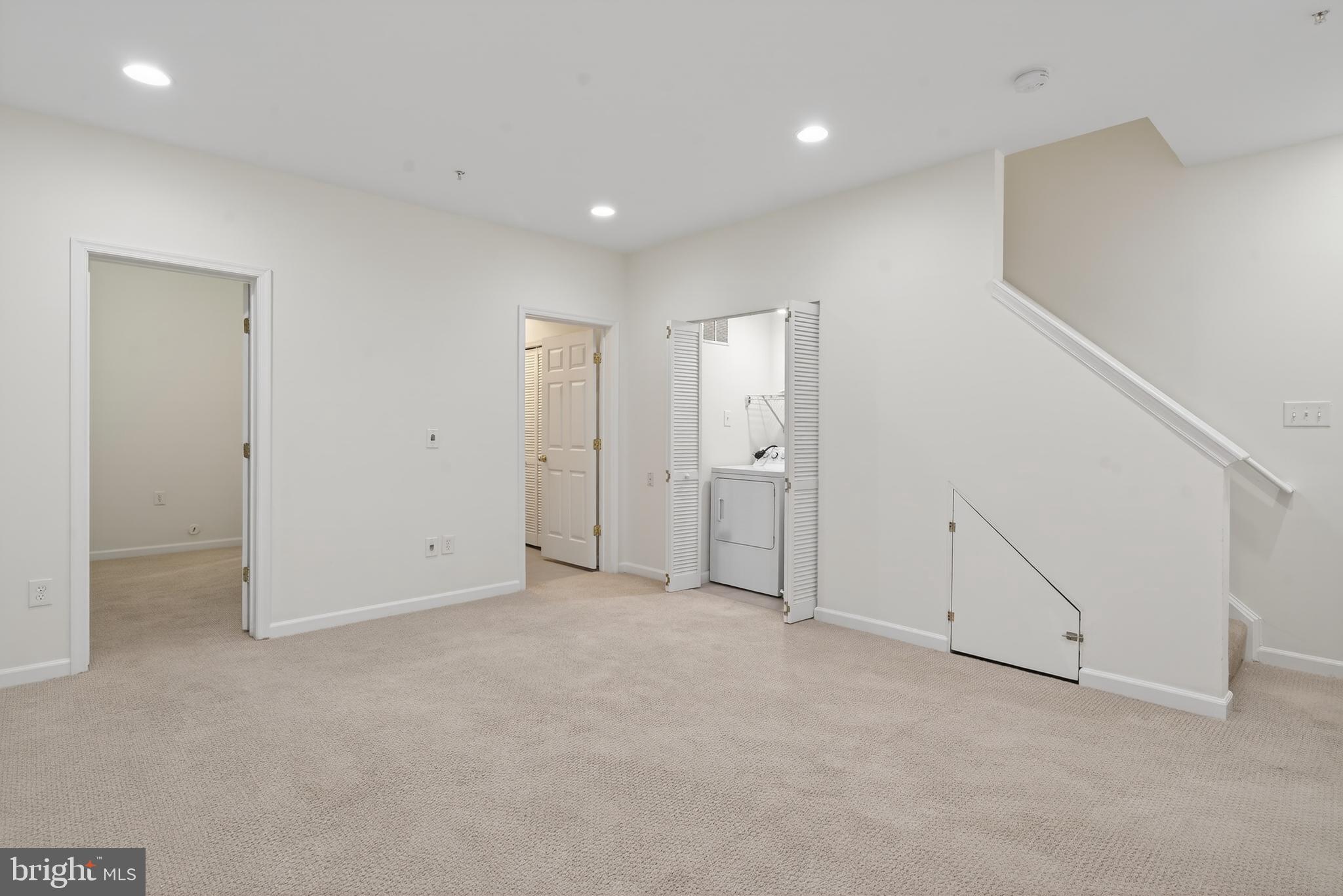 23616 Public House Road Clarksburg, MD 20871 - Photo 18 of 35 an empty room with white walls and natural light