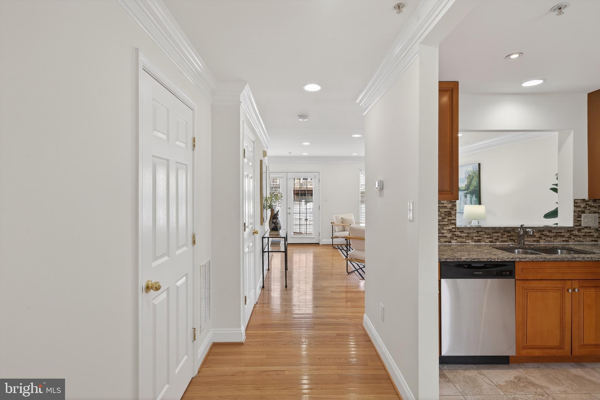 23616 Public House Road Clarksburg, MD 20871 - Photo 4 of 35 a view of a hallway with a living room and dining room view