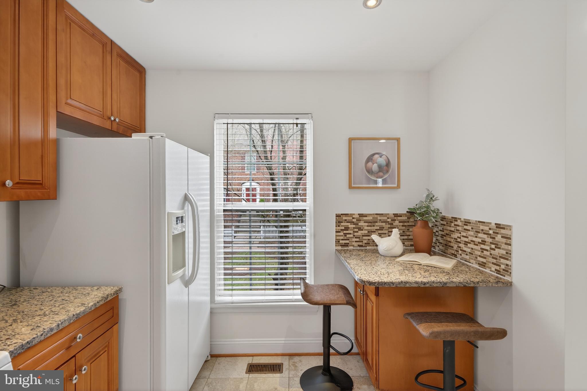 23616 Public House Road Clarksburg, MD 20871 - Photo 7 of 35 a kitchen with stainless steel appliances granite countertop a refrigerator and a stove top oven