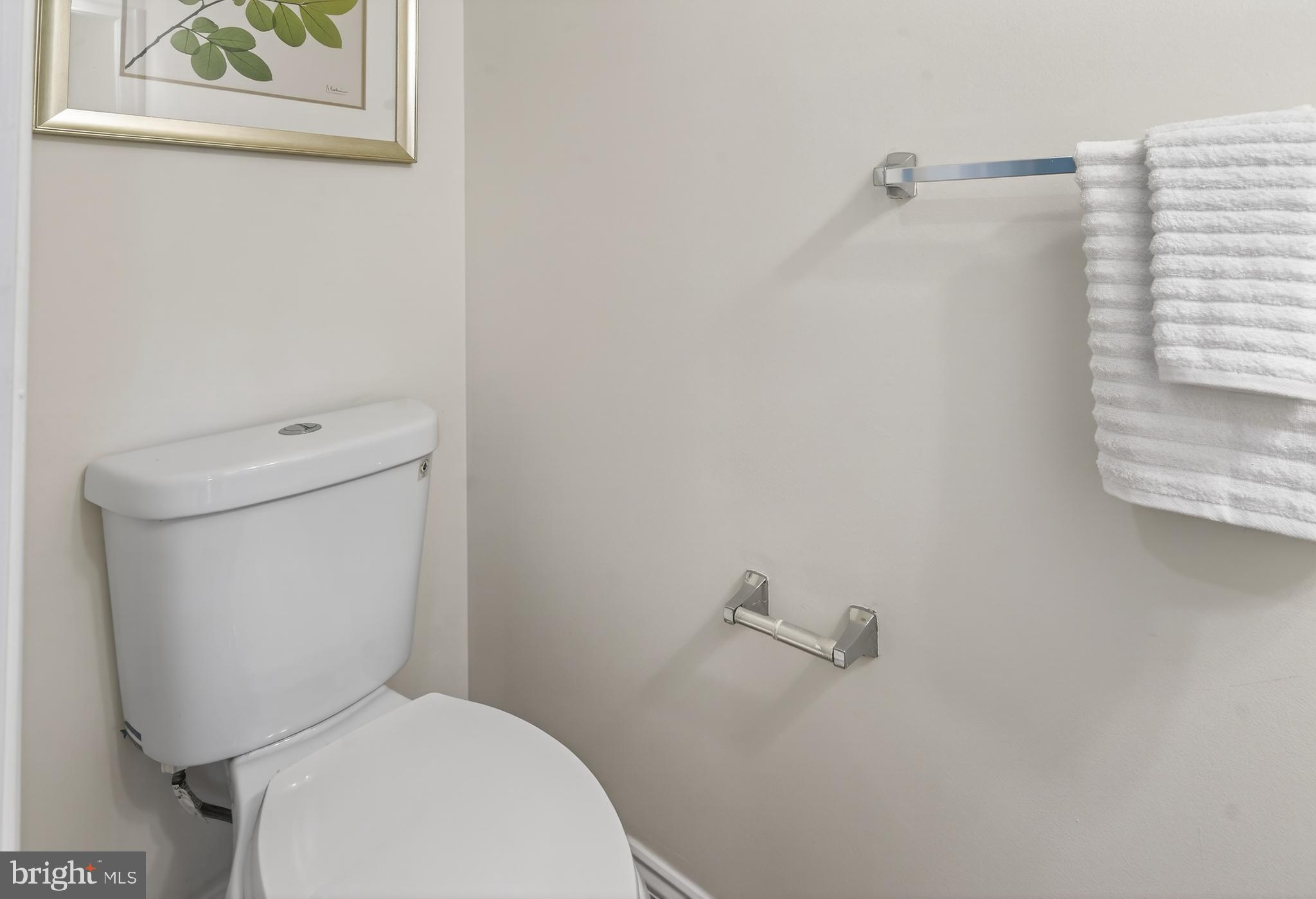 23616 Public House Road Clarksburg, MD 20871 - Photo 8 of 35 a white toilet sitting next to a white wall