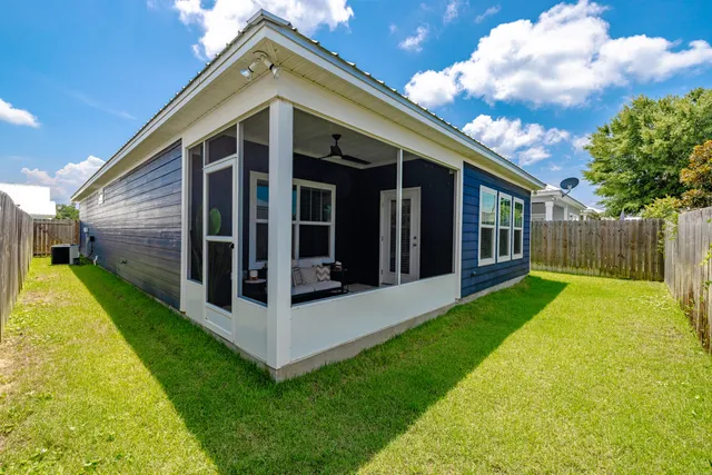 a view of a back yard of the house