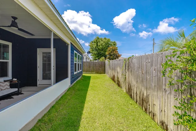 a view of swimming pool with a backyard