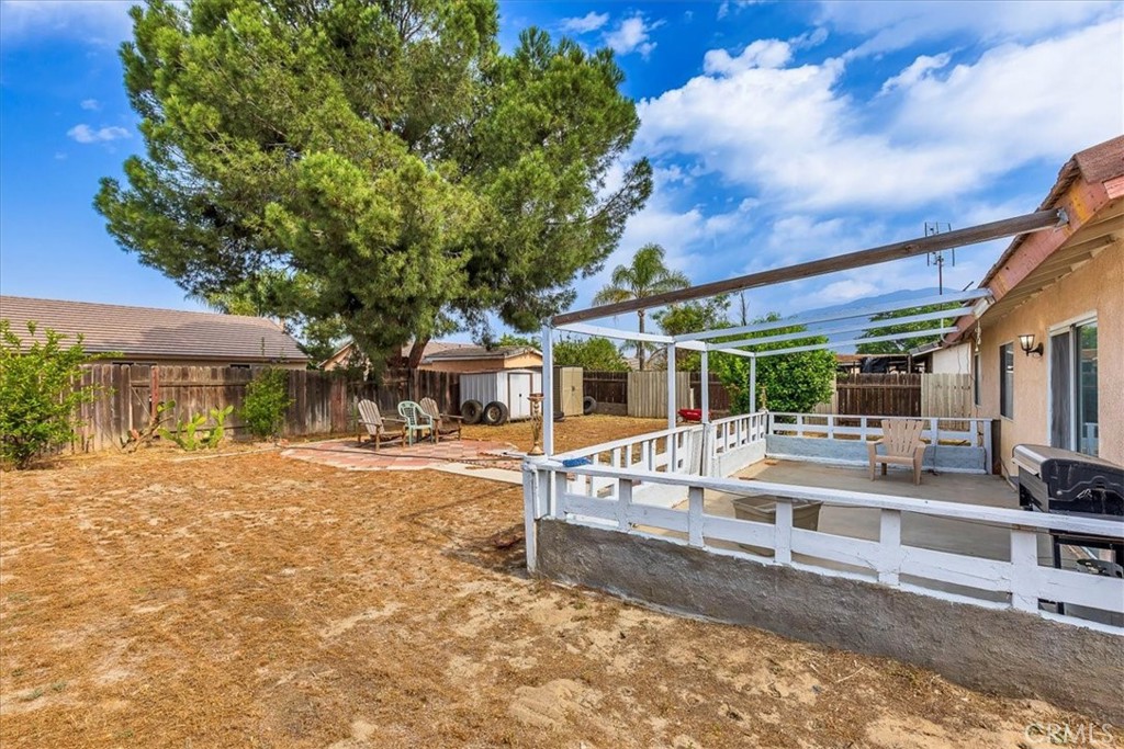 162 Peppertree Way San Jacinto, CA 92583 - Photo 17 of 23 a view of a house with backyard porch and sitting area