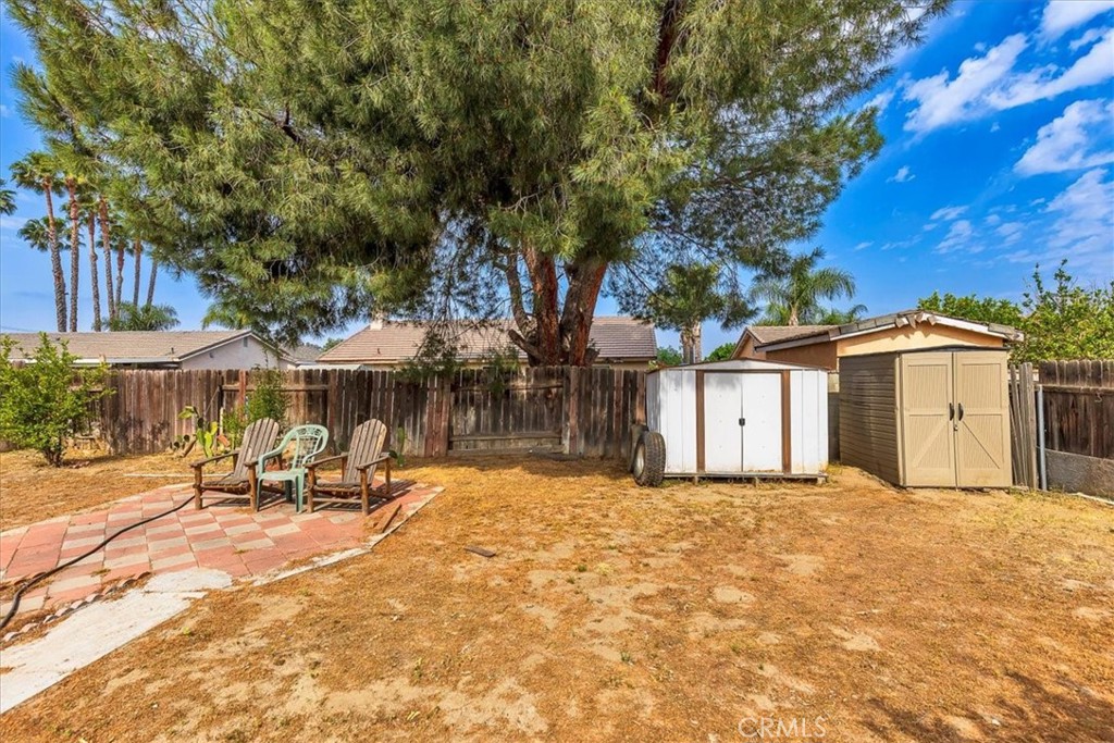 162 Peppertree Way San Jacinto, CA 92583 - Photo 22 of 23 a view of a house with a patio