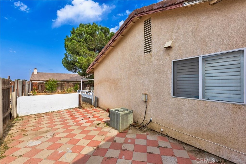 162 Peppertree Way San Jacinto, CA 92583 - Photo 23 of 23 a view of a back yard of the house