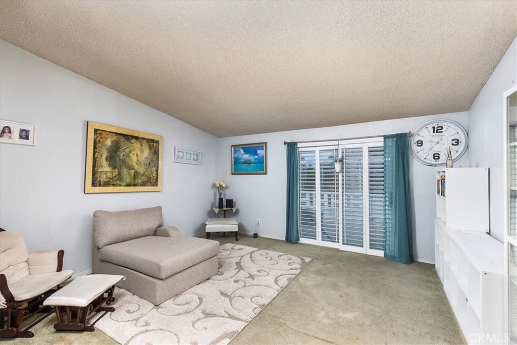 162 Peppertree Way San Jacinto, CA 92583 - Photo 8 of 23 a living room with furniture and a window