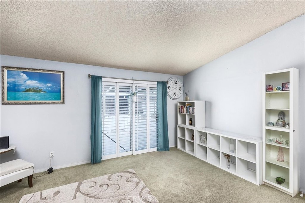 162 Peppertree Way San Jacinto, CA 92583 - Photo 9 of 23 a view of a bedroom with furniture and window