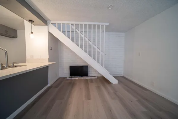 a view of entryway with wooden floor