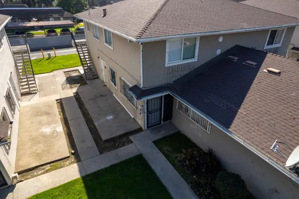 a aerial view of a house with a garden