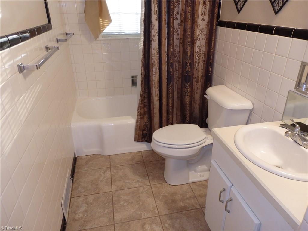 206 Coleridge Road Ramseur, NC 27316 - Photo 19 of 30 2nd bath with tile floors