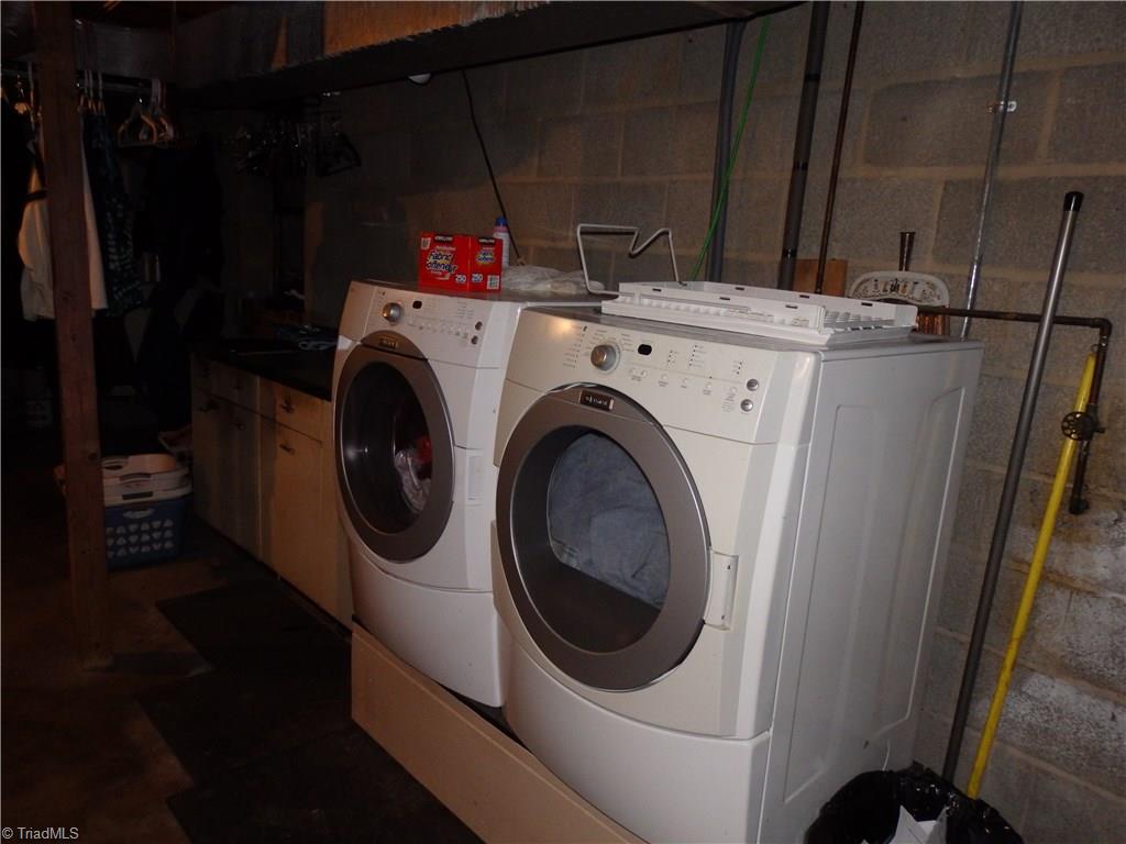206 Coleridge Road Ramseur, NC 27316 - Photo 21 of 30 washer and dryer in basement remain.