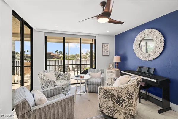 a spacious bathroom with a double vanity sink a mirror and a shower