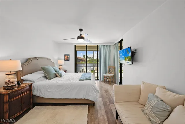 a view of a balcony with furniture and city view