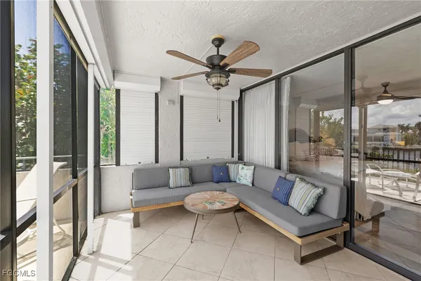 a view of balcony with furniture
