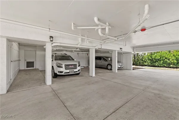 a view of a swimming pool with a yard