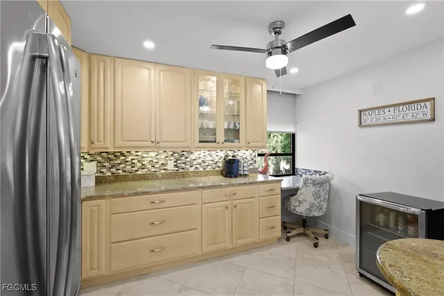 a spacious bathroom with a granite countertop sink mirror and a