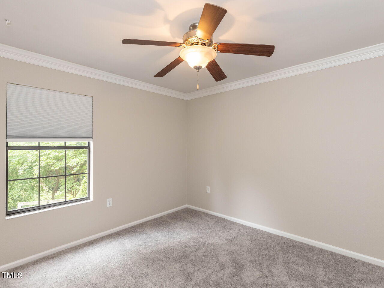 7833 Falcon Rest Circle Raleigh, NC 27615 - Photo 17 of 26 an empty room with a window