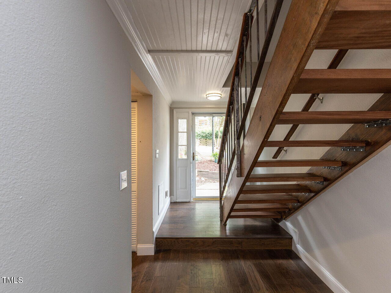 7833 Falcon Rest Circle Raleigh, NC 27615 - Photo 3 of 26 a view of entryway with wooden floor