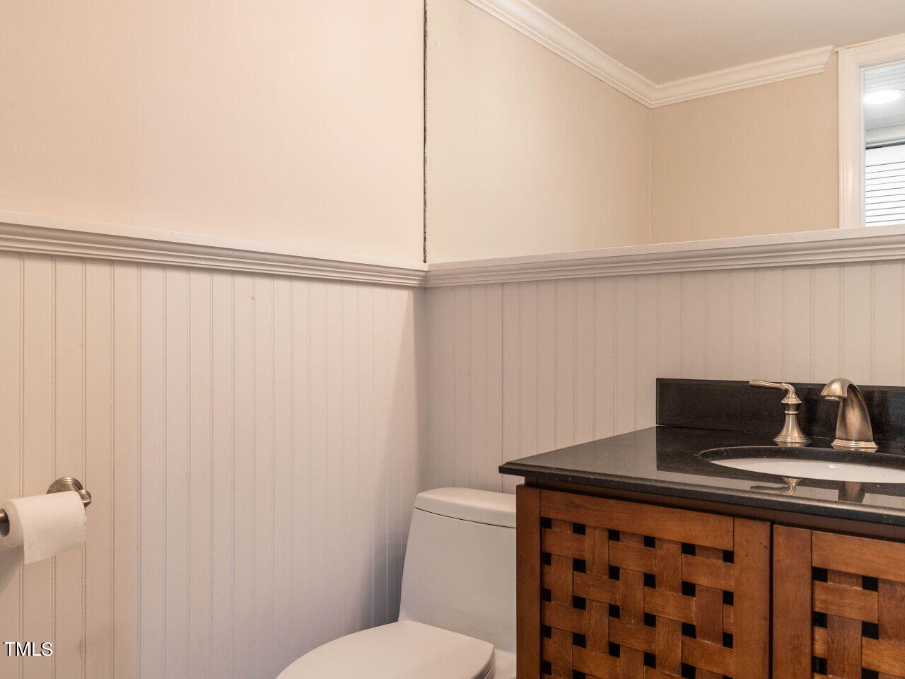 7833 Falcon Rest Circle Raleigh, NC 27615 - Photo 10 of 26 a bathroom with a sink a toilet and vanity