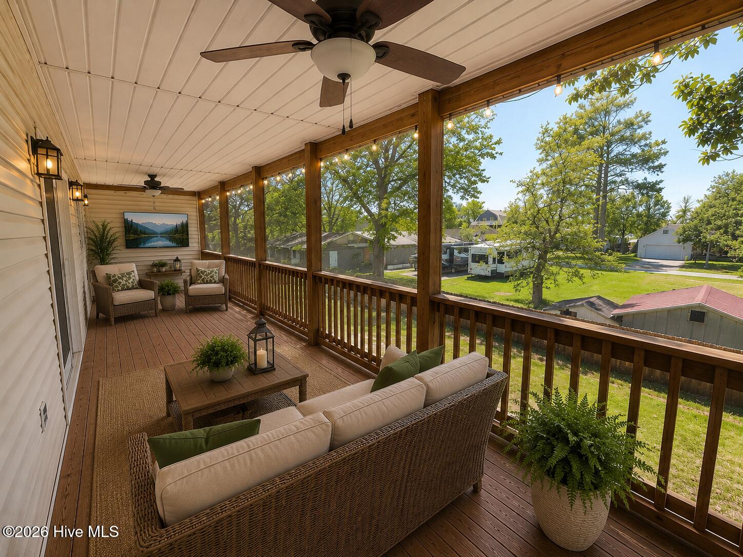 511 North B Street Bridgeton, NC 28519 - Photo 24 of 26 Upper deck screened porch virtually staged