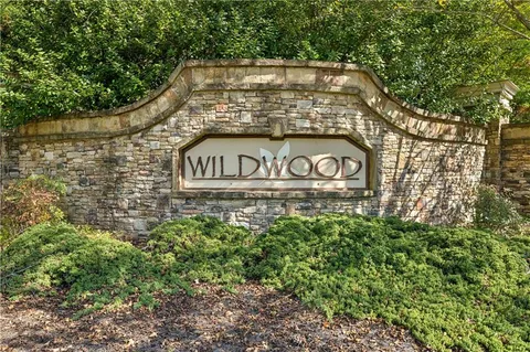 a sign broad on the side of a road