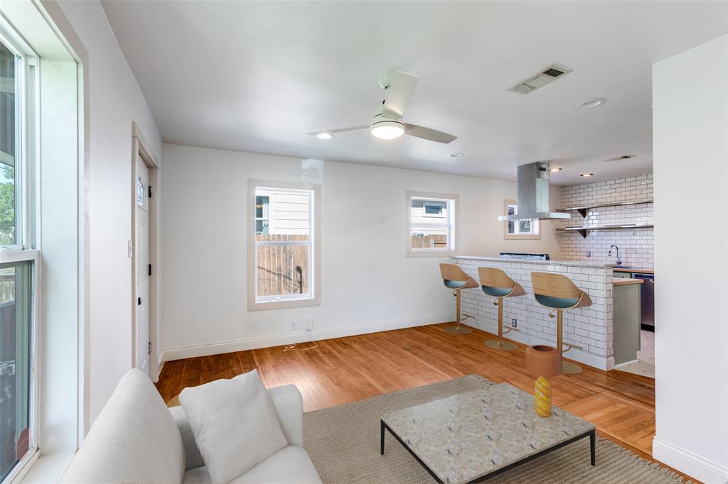 2012 Payne Avenue, Unit A Austin, TX 78757 - Photo 8 of 33 Open-concept living space white walls, and a modern ceiling fan