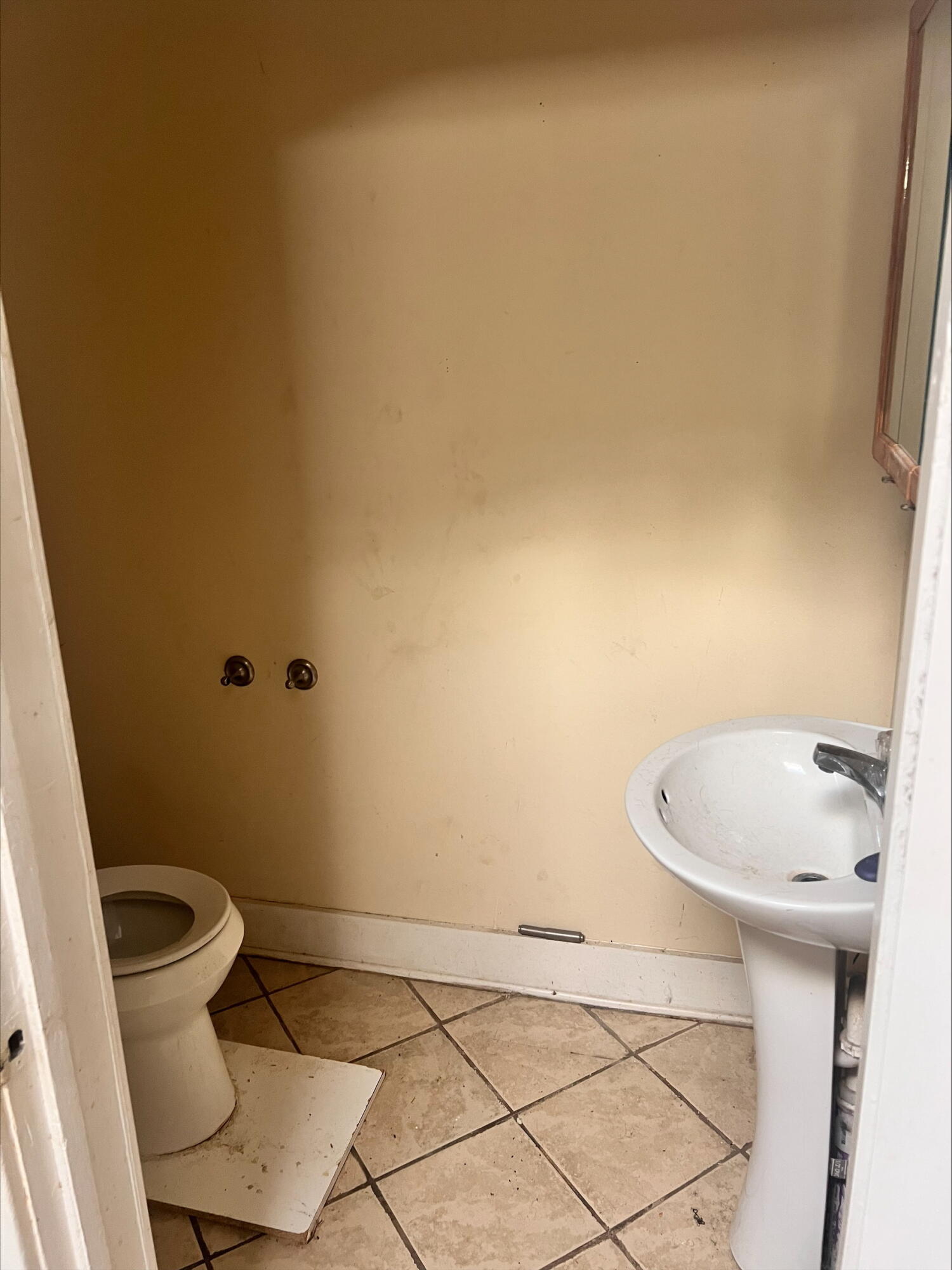 906 5th Street Southeast Roanoke, VA 24013 - Photo 8 of 11 a bathroom with a sink and toilet