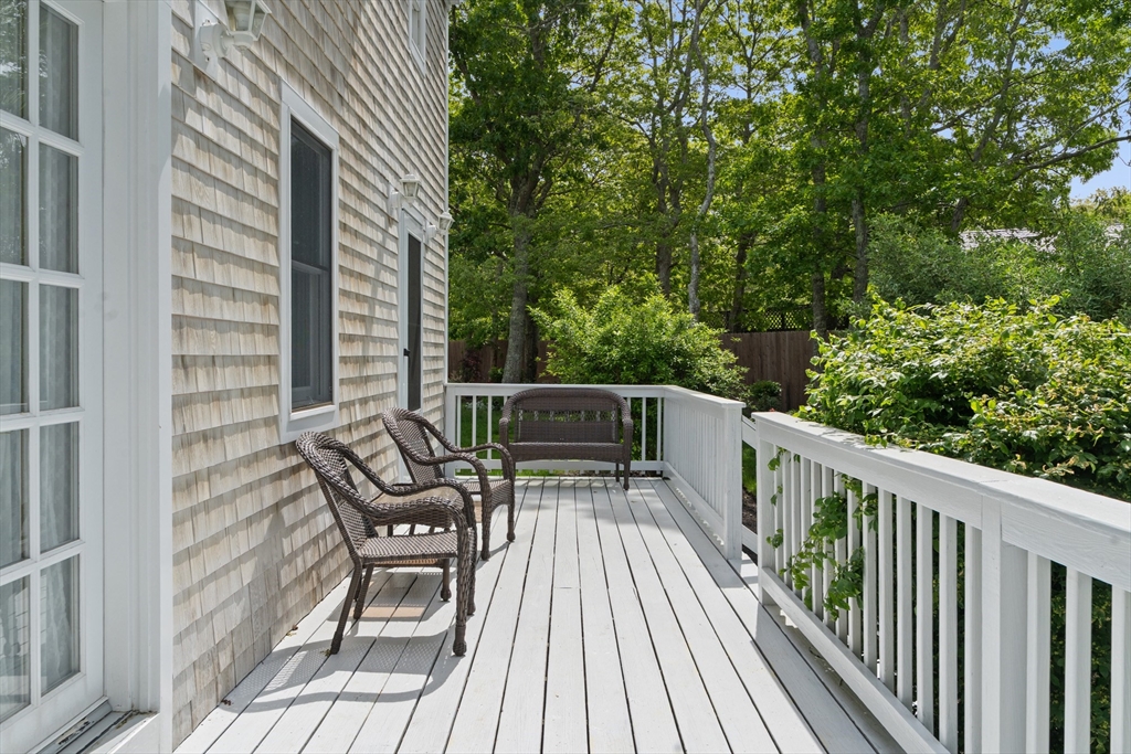 4 Hye Lane Edgartown, MA 02539 - Photo 40 of 41 a view of balcony with wooden floor and outdoor seating